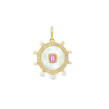 Mother Of Pearl Charm With Pink Sapphire Center
