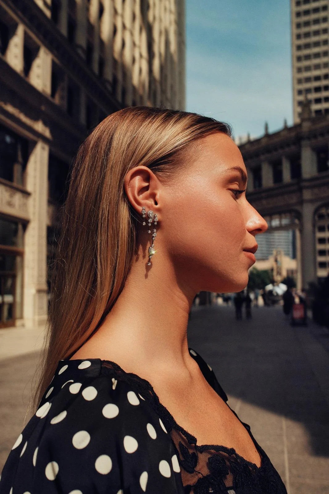 Model in profile wearing a SWAY natural diamond ear stack